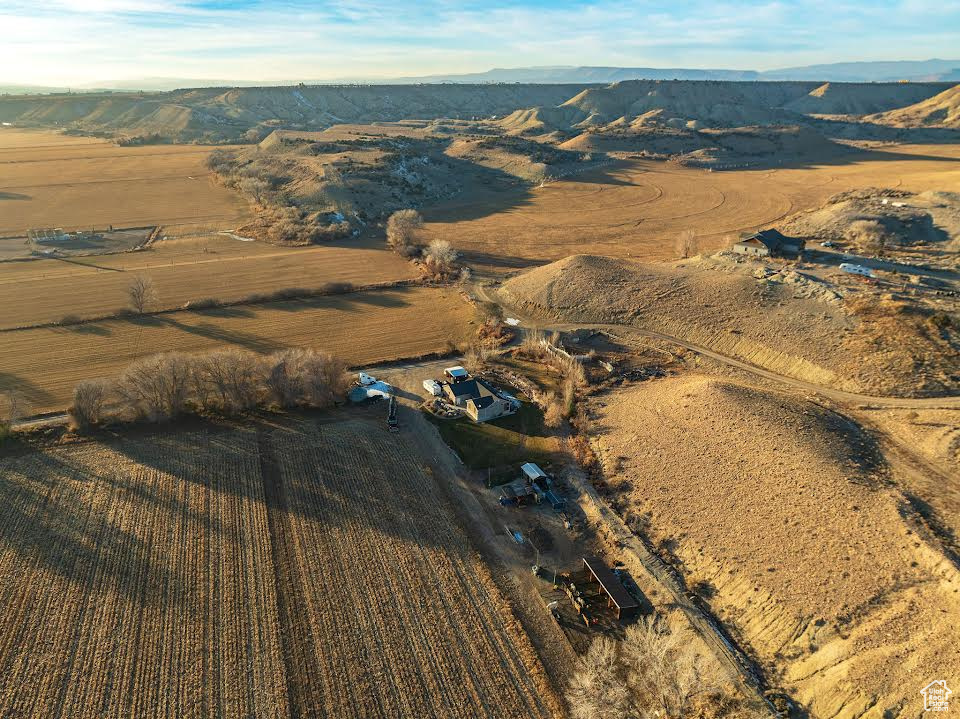 Drone / aerial view with a mountain view and a rural view