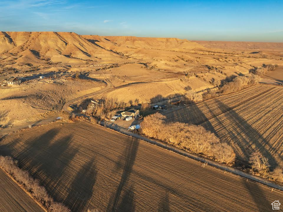 Birds eye view of property with a rural view