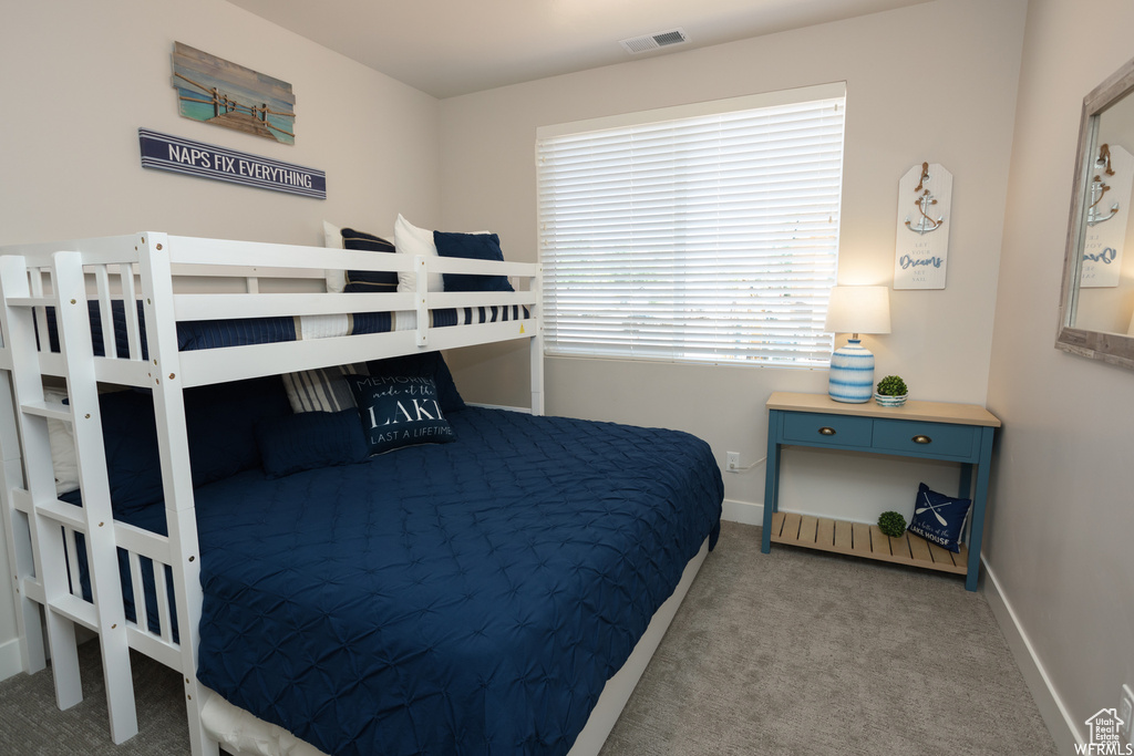 Bedroom featuring carpet