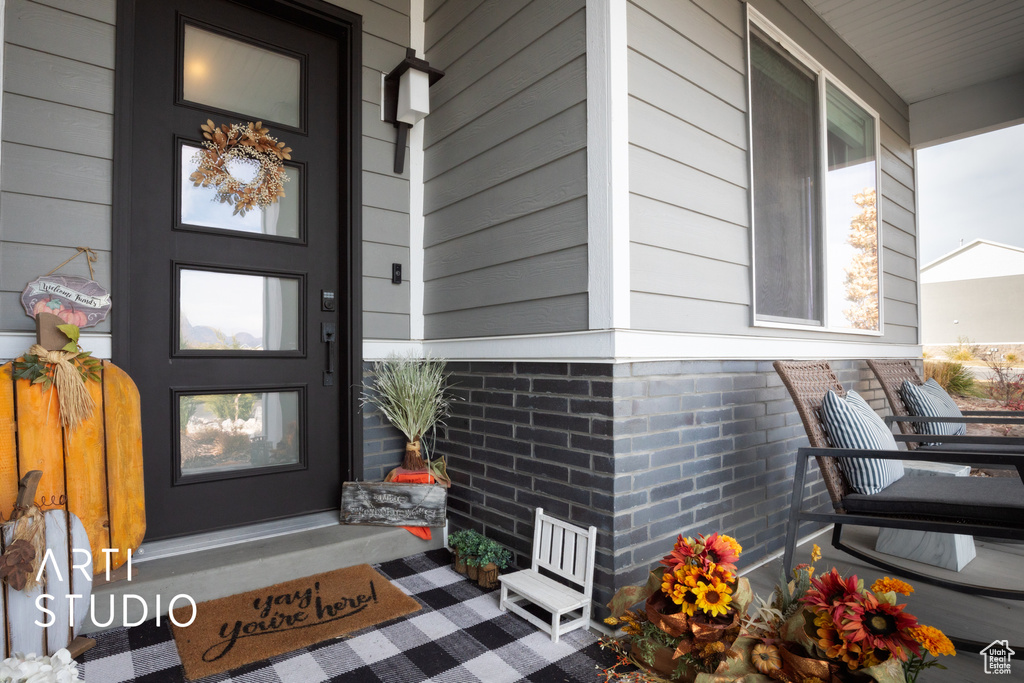 Property entrance featuring a porch