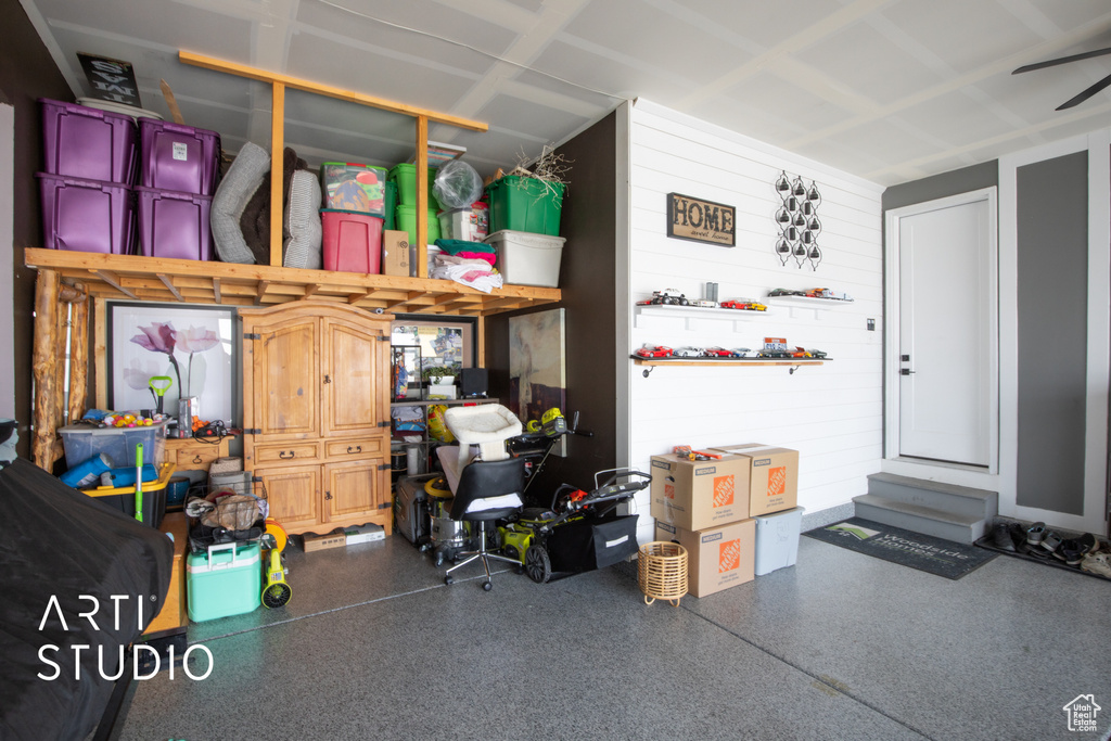 Garage featuring ceiling fan