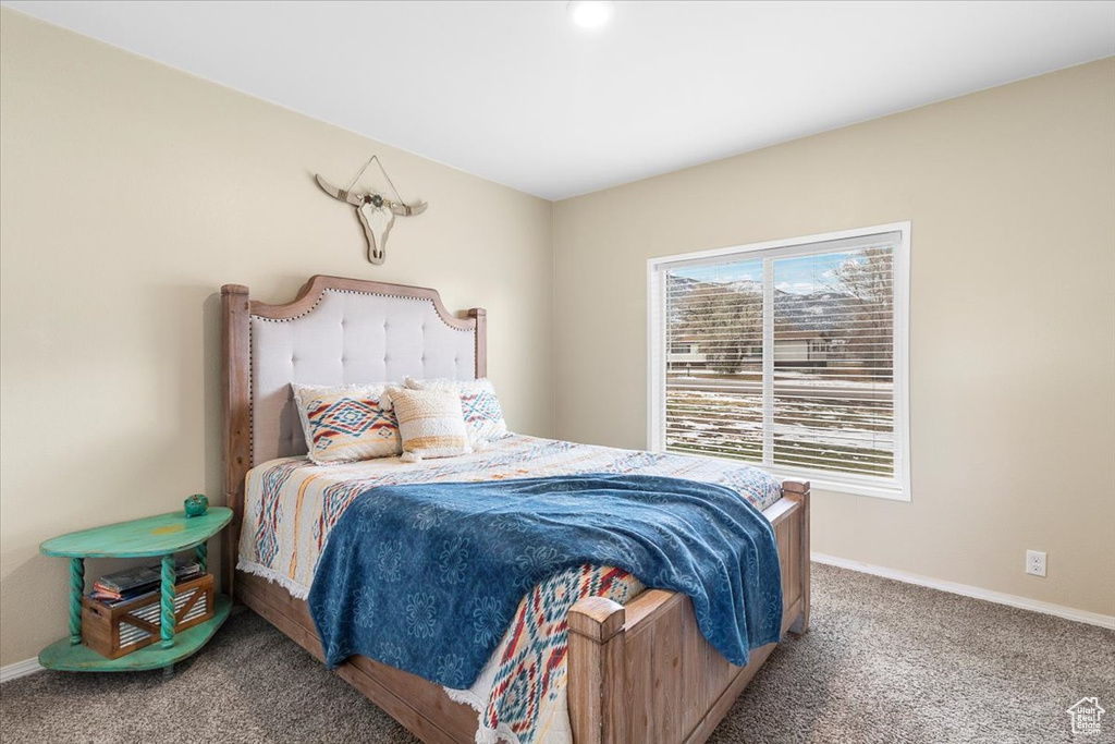 View of carpeted bedroom