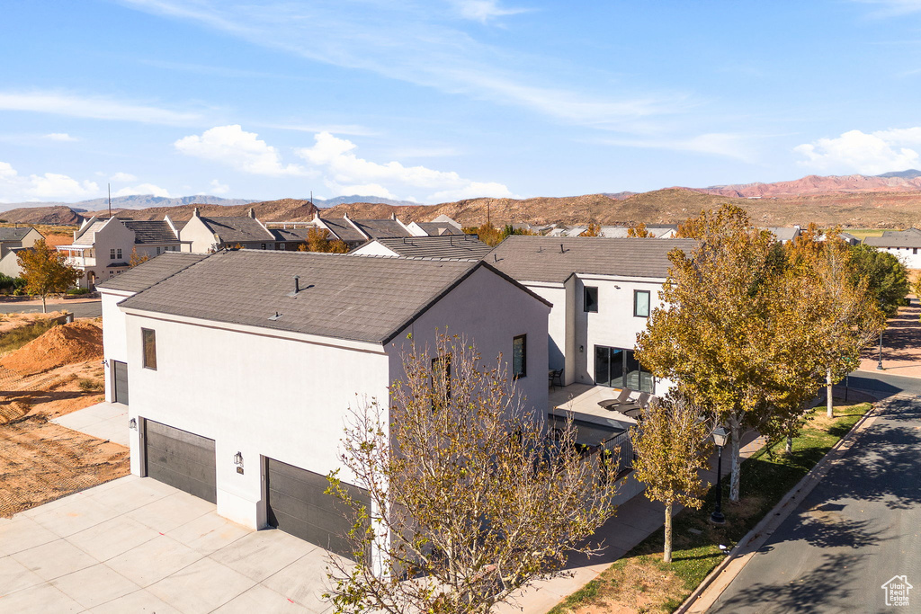 Exterior space featuring a mountain view