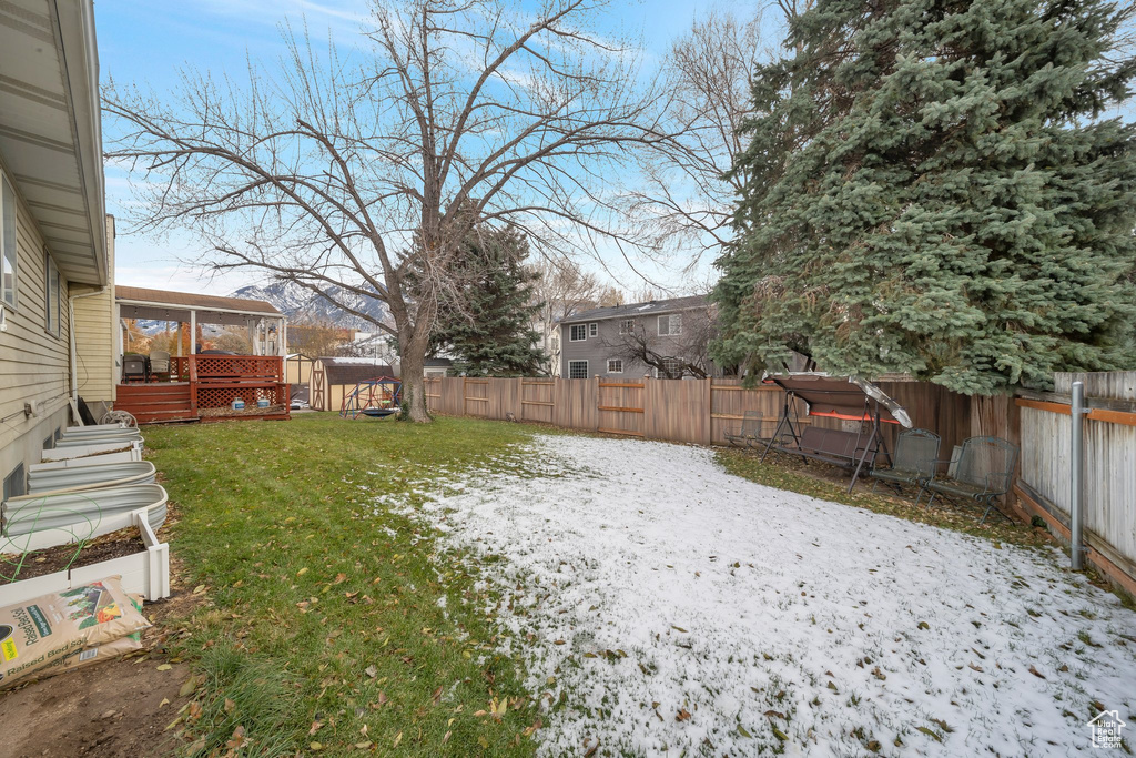 View of yard featuring a deck