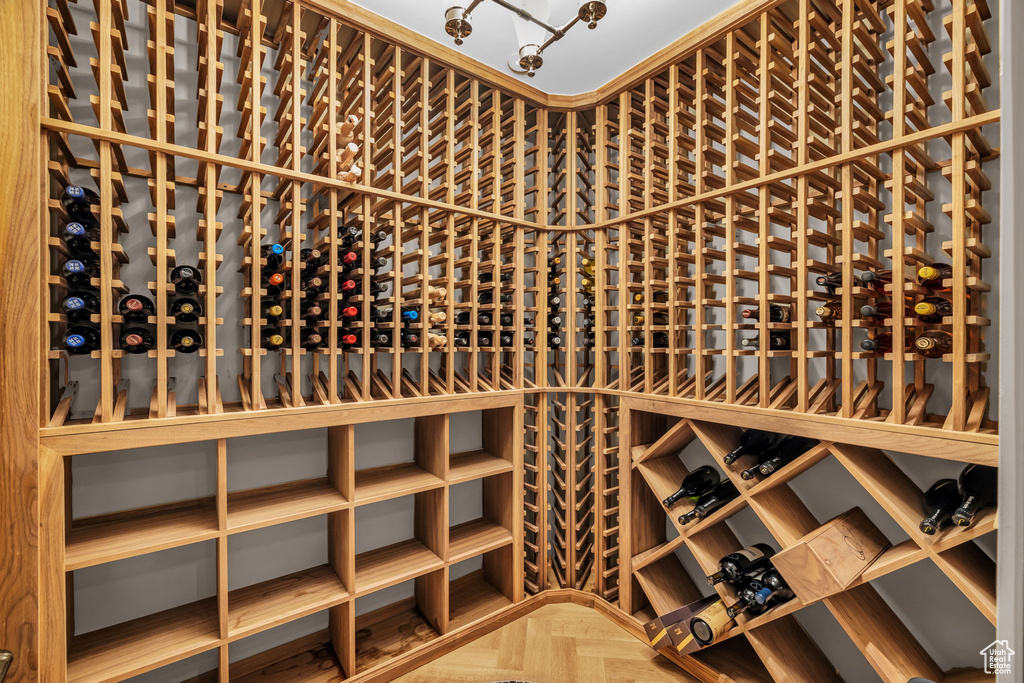 Wine cellar featuring parquet floors