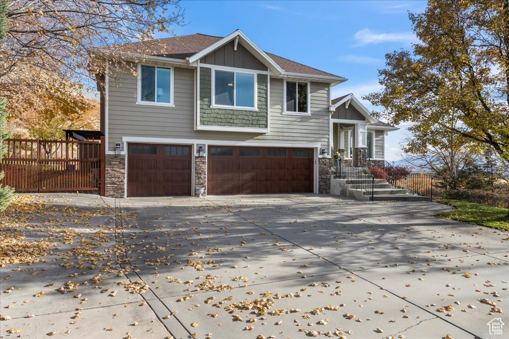 Craftsman house featuring a garage