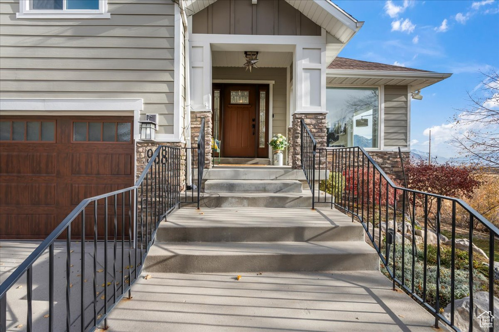 Entrance to property with a garage