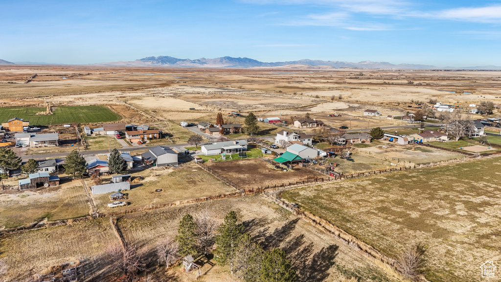 Birds eye view of property with a mountain view