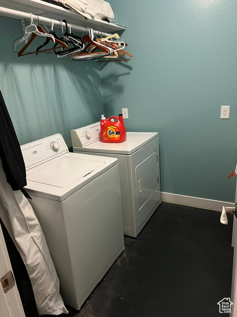 Laundry area featuring washing machine and clothes dryer
