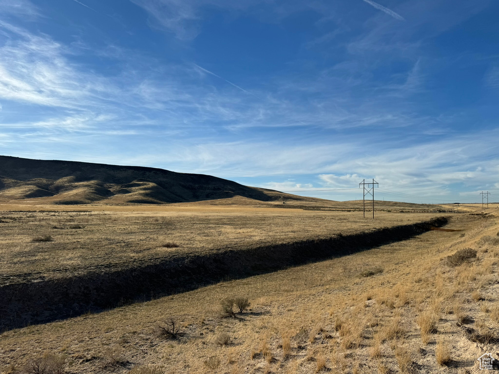Property view of mountains featuring a rural view