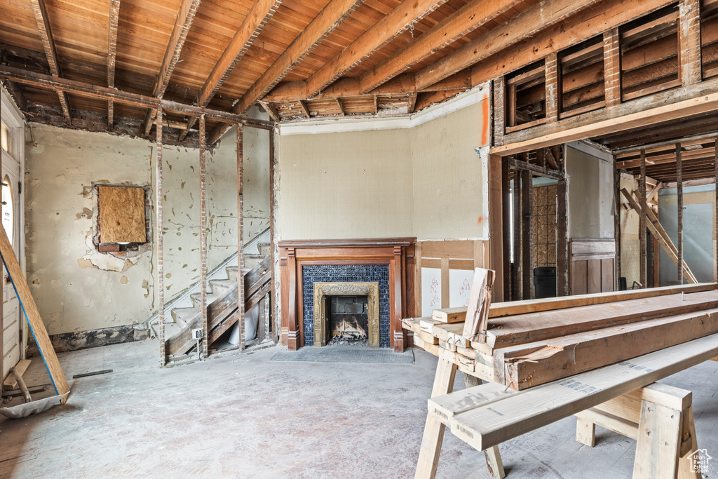 Basement with a tiled fireplace