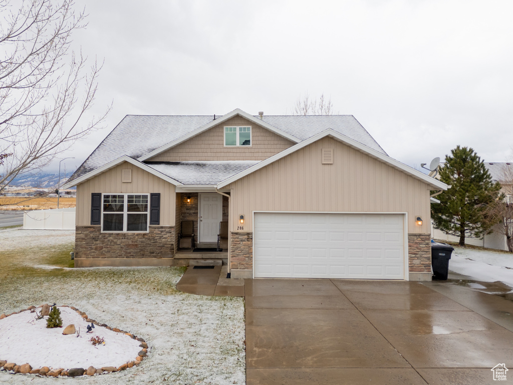 View of front of home featuring a garage