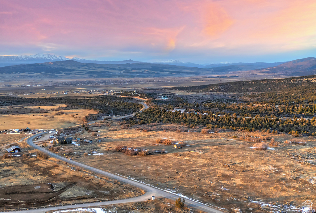 Aerial view at dusk with a mountain view