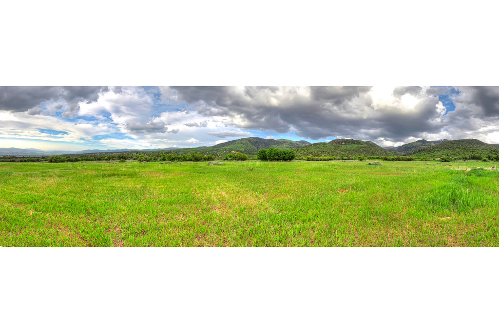 View of yard featuring a mountain view and a rural view