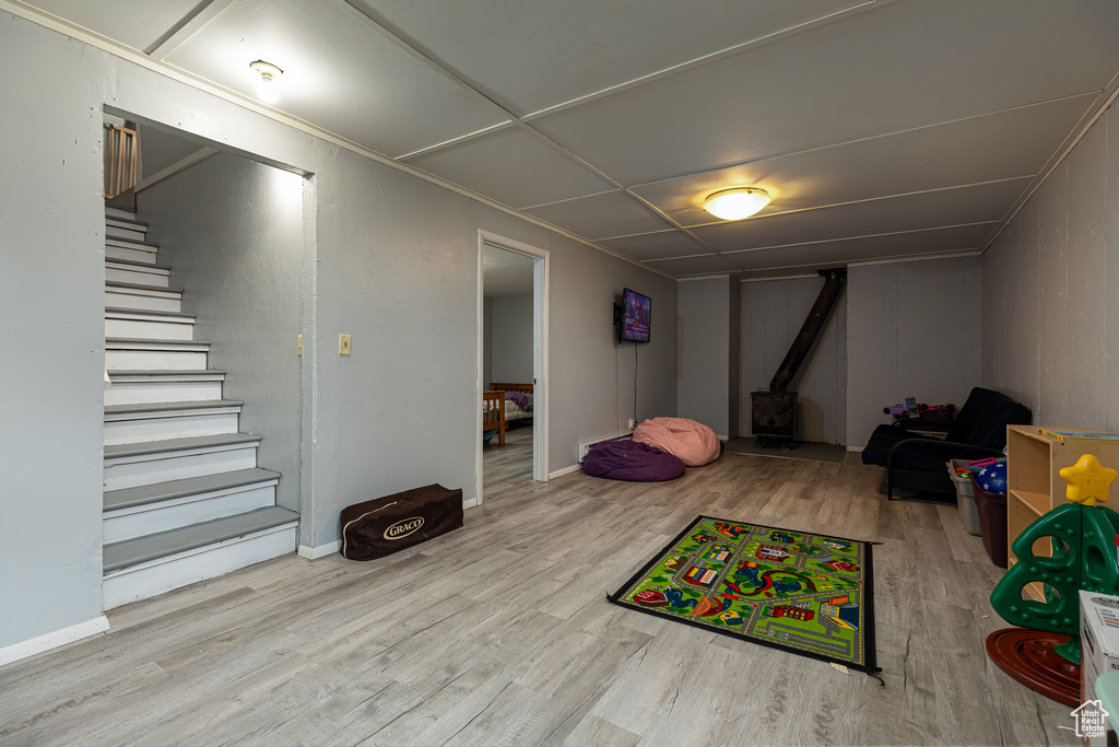 Playroom with light wood-type flooring