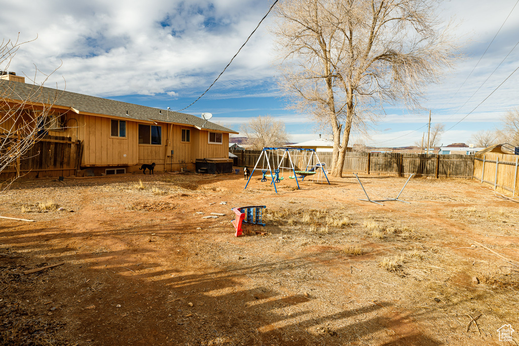 View of yard with a playground