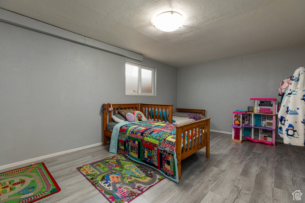Bedroom featuring hardwood / wood-style floors