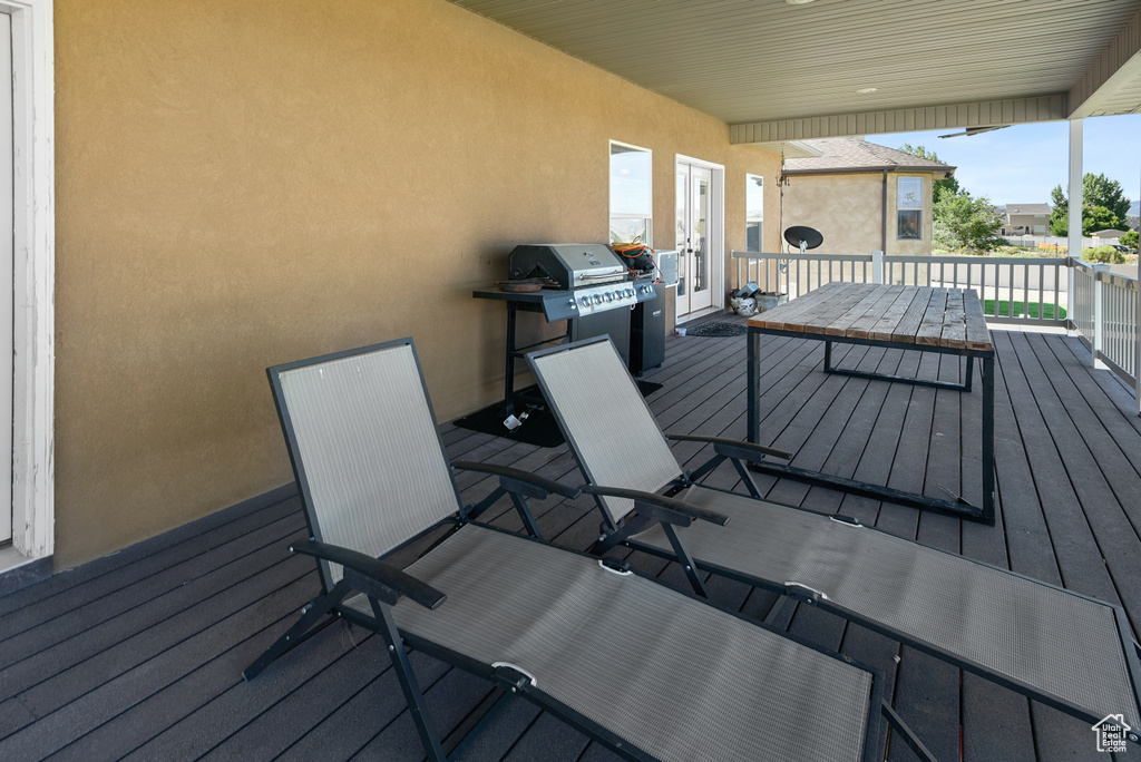 Deck featuring a grill