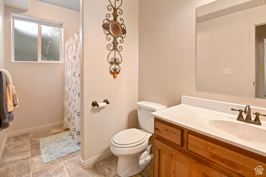 Bathroom with vanity and toilet