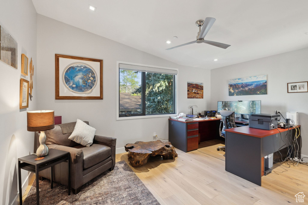 Office featuring a ceiling fan, light wood-type flooring, recessed lighting, vaulted ceiling, and baseboards