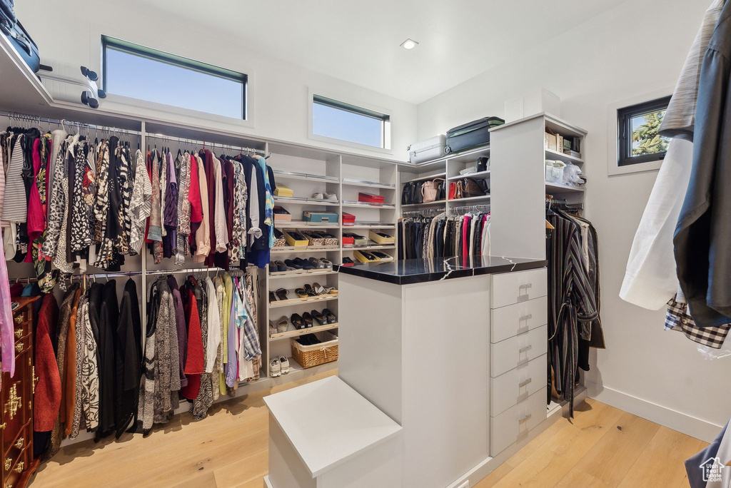 Spacious closet with wood finished floors