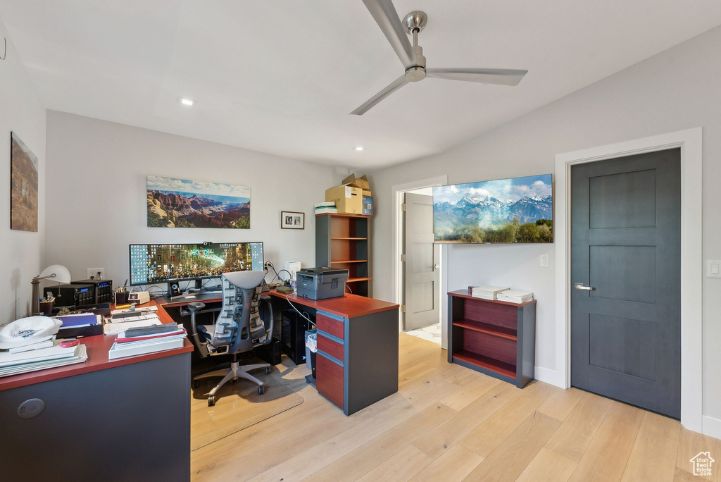 Home office featuring a ceiling fan, light wood-style floors, and recessed lighting