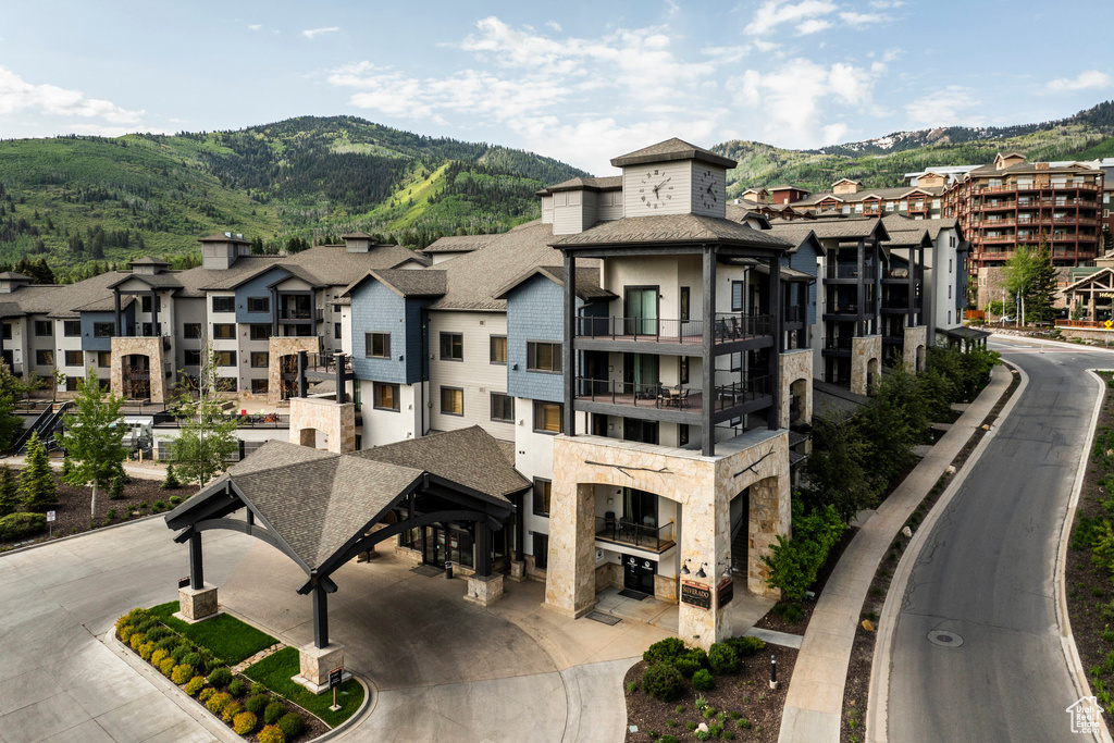 View of building exterior featuring a mountain view