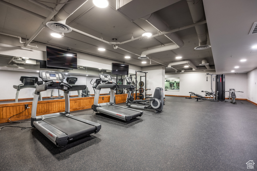 Exercise room featuring baseboards
