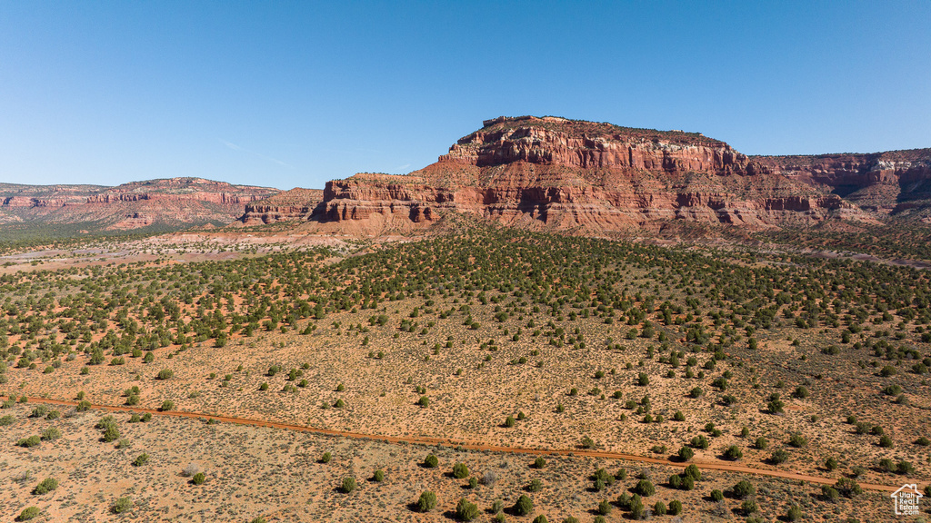 View of mountain backdrop featuring a desert landscape