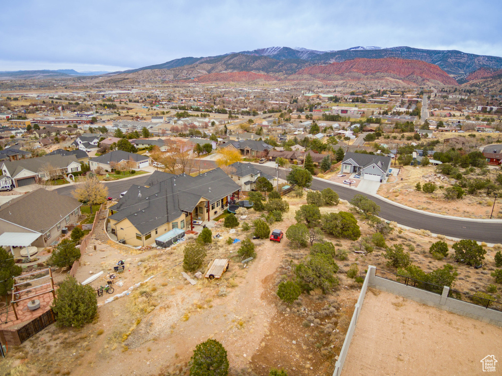 Birds eye view of property with a mountain view