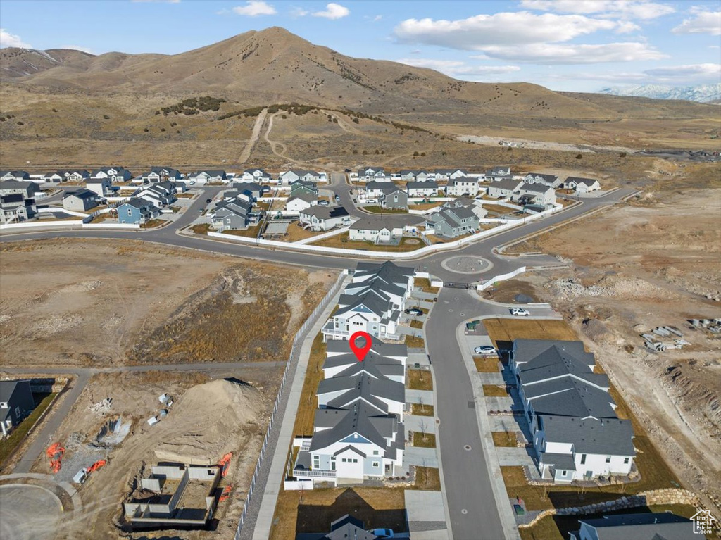 Drone / aerial view with a residential view and a mountain view
