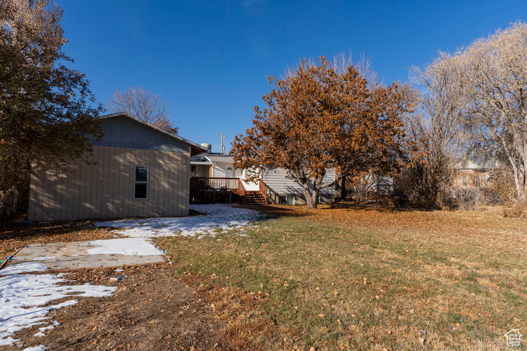 View of yard featuring a deck
