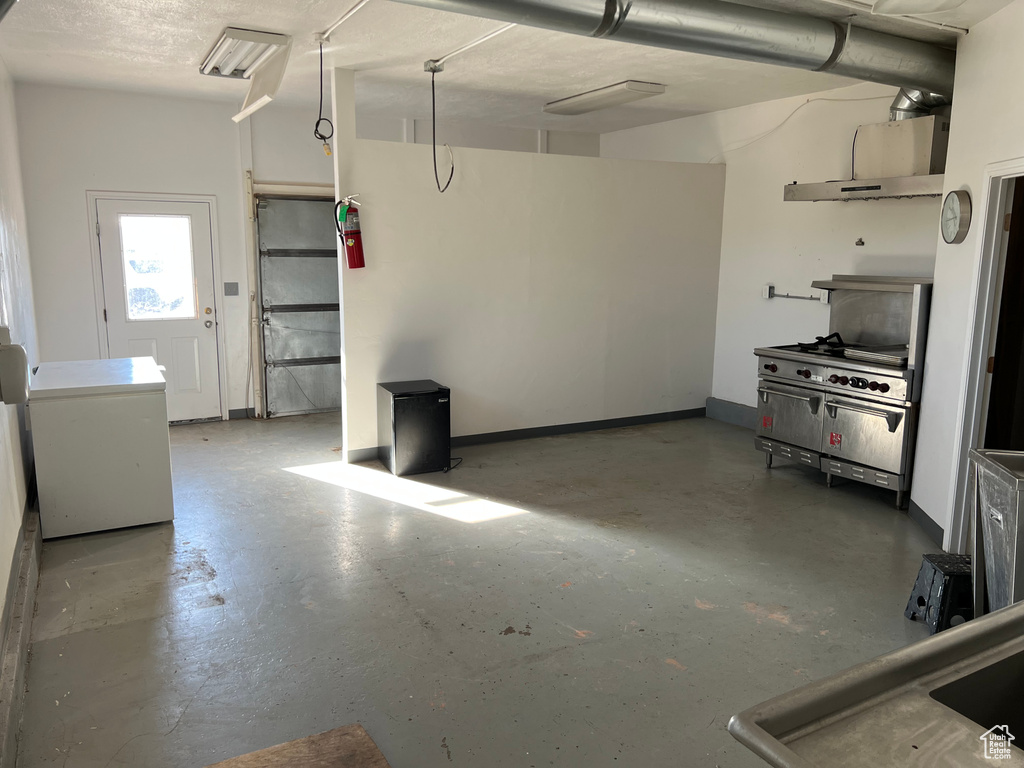 Garage with refrigerator