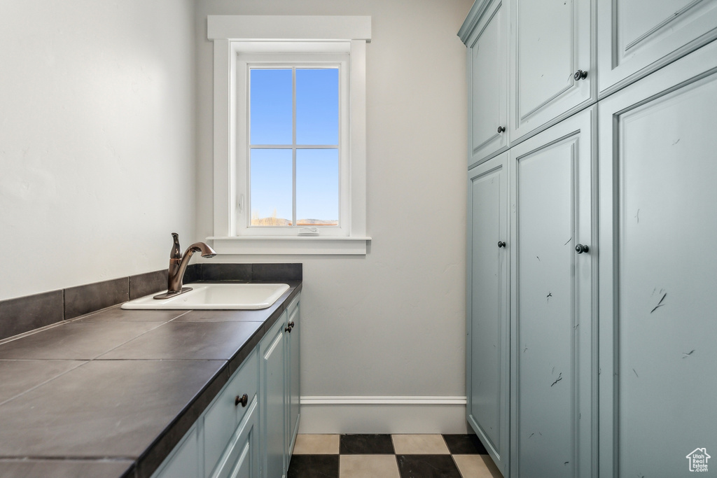 Laundry room featuring sink
