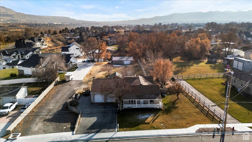 Birds eye view of property with a mountain view