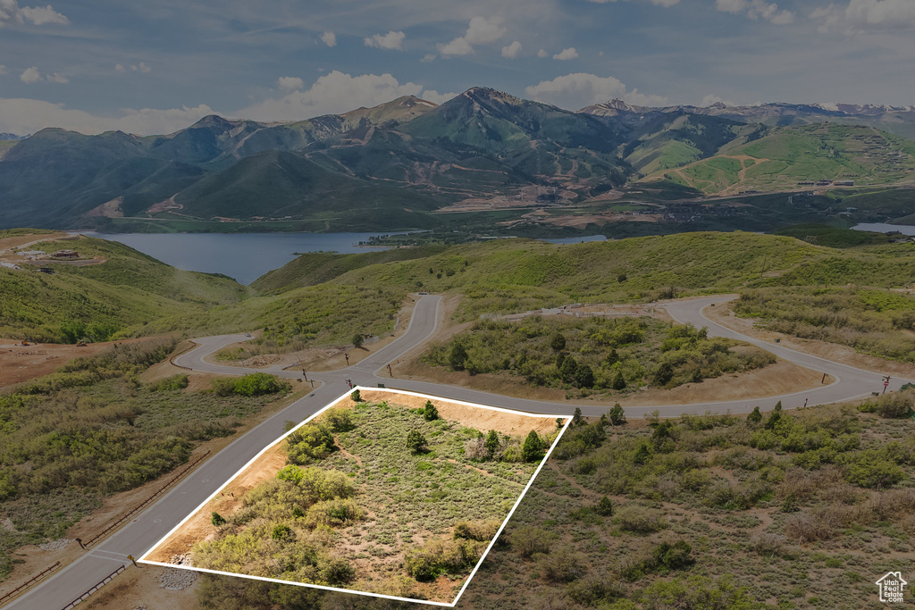 Mountain view featuring a large body of water