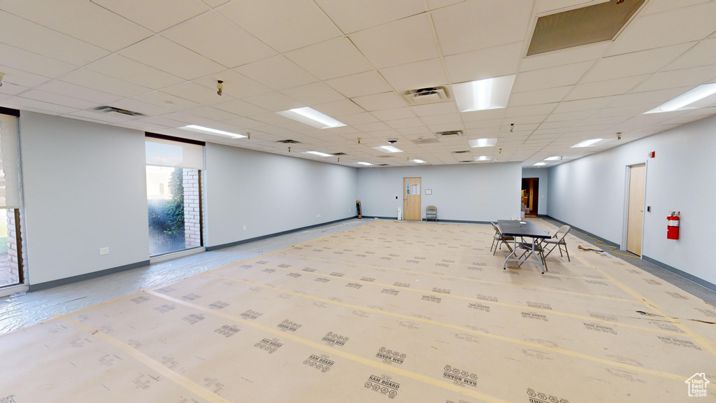 Unfurnished room with a paneled ceiling