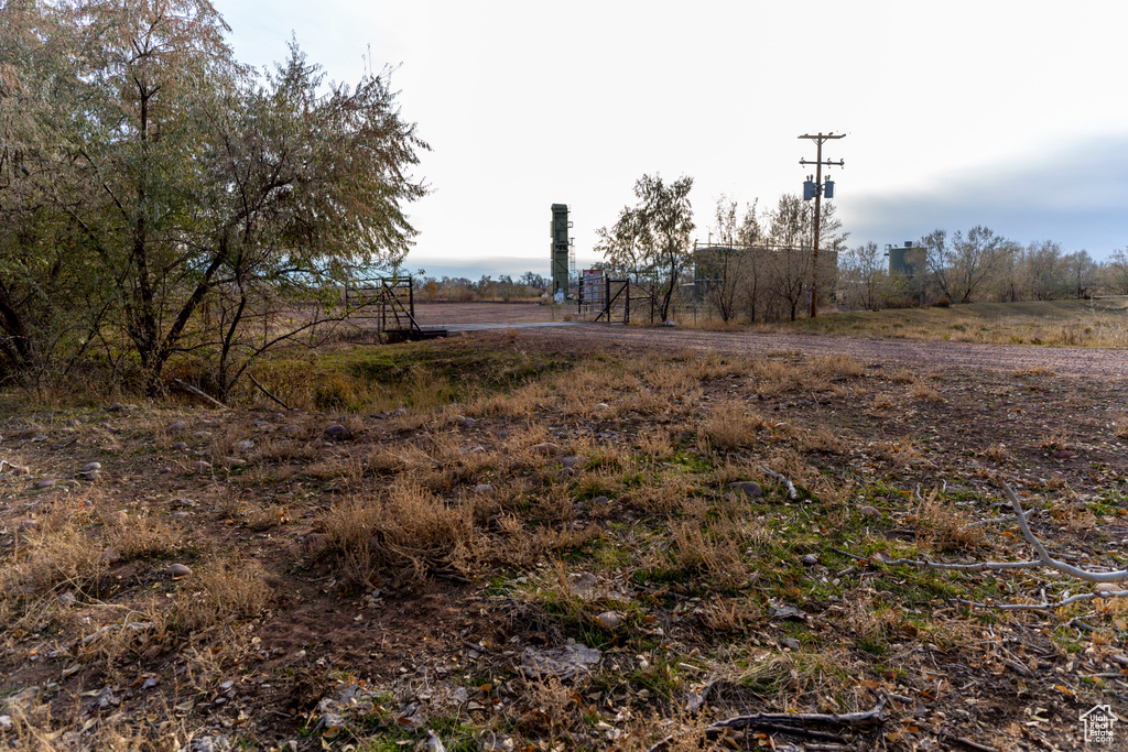 View of yard with a rural view