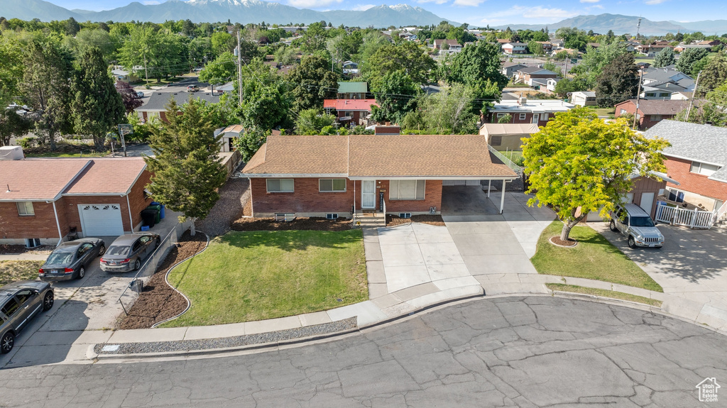 Birds eye view of property with a mountain view