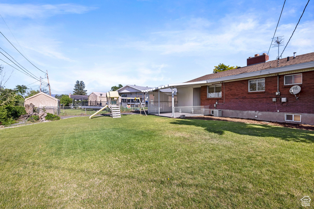 View of yard featuring central AC unit