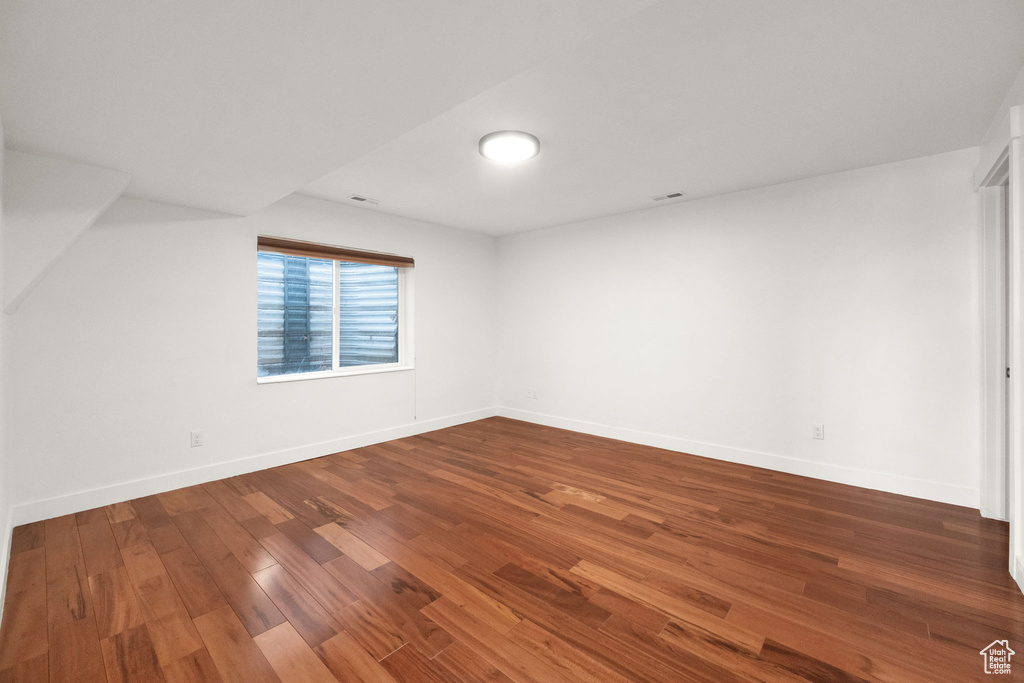 Bonus room featuring wood-type flooring