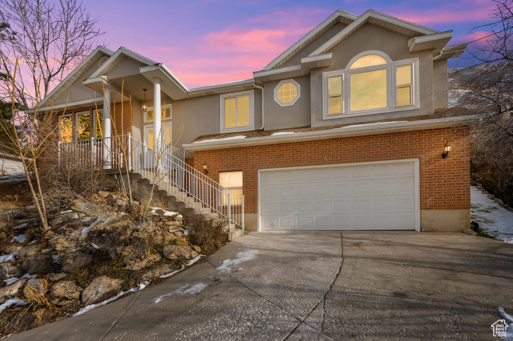 View of front of home with a garage