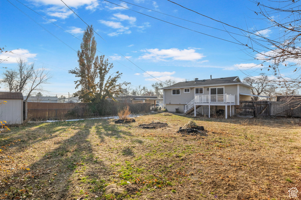 View of yard featuring a deck