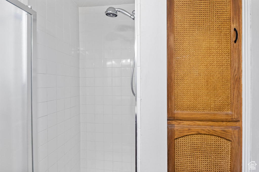 Bathroom with tiled shower