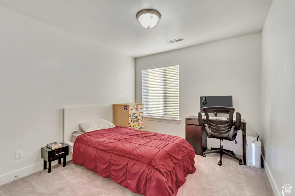 View of carpeted bedroom