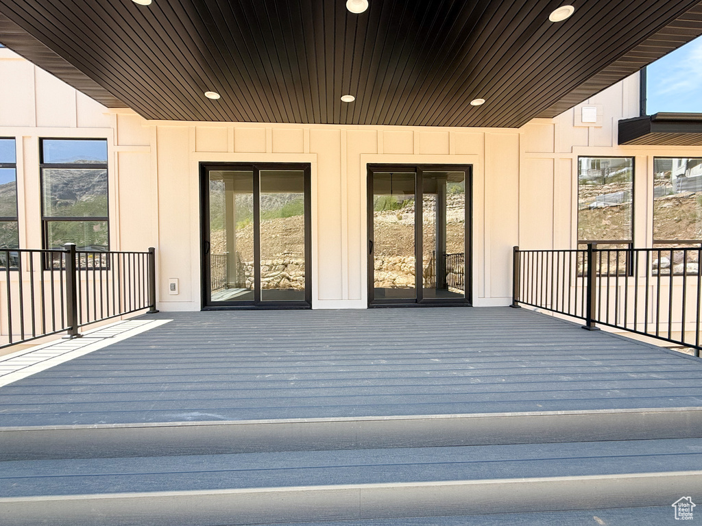Entrance to property featuring board and batten siding