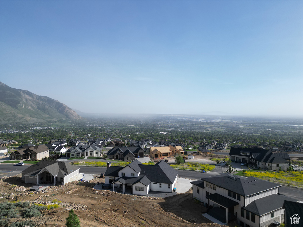 Aerial view of residential area with a mountain backdrop