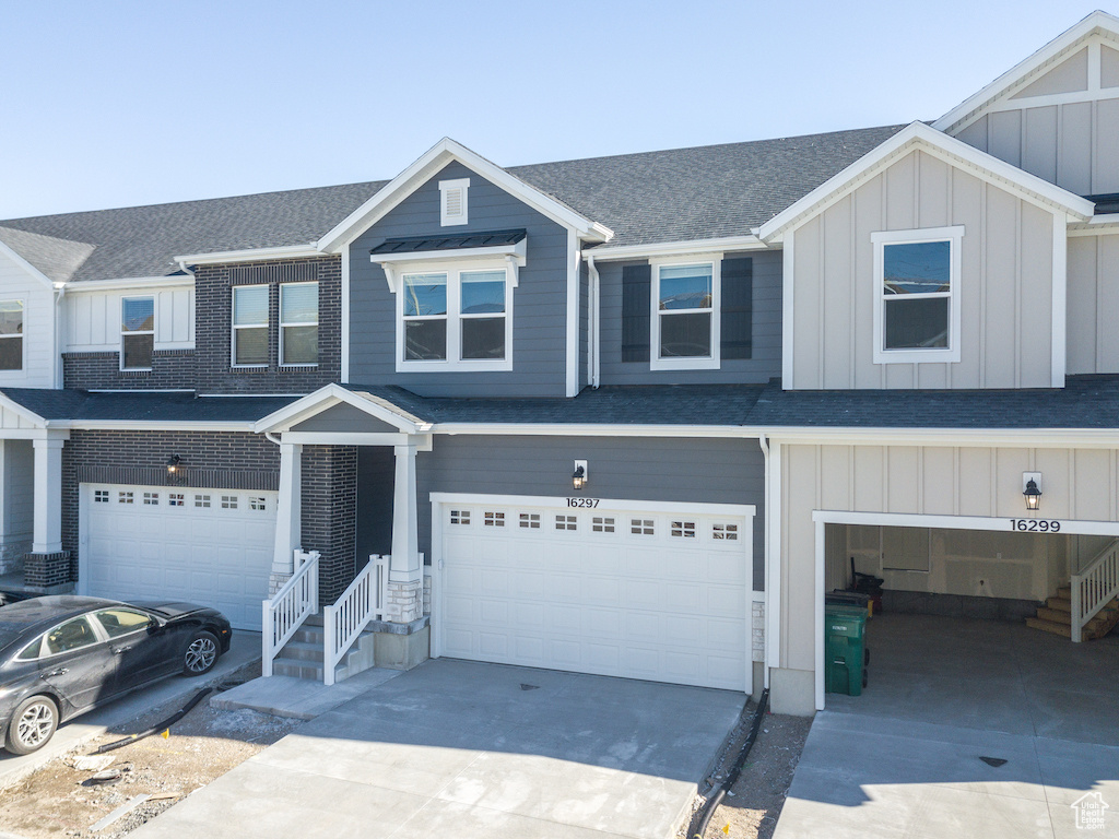 View of property featuring a garage