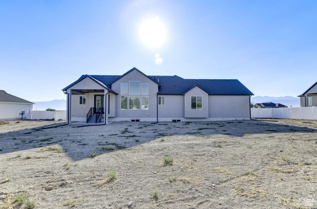 View of front of home with a mountain view