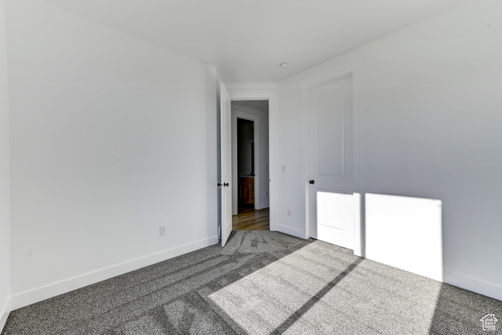 Spare room with carpet flooring